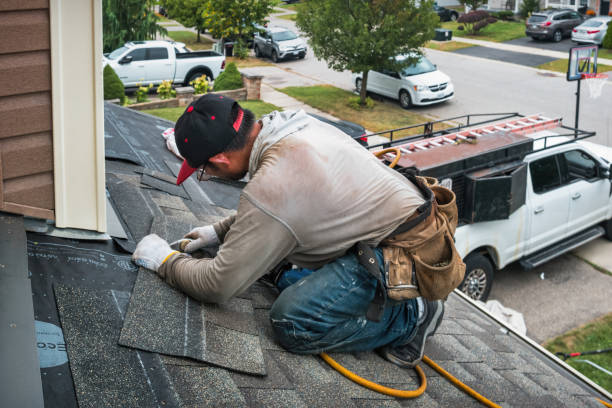 Professional Roofing technician working in Hartford, IL